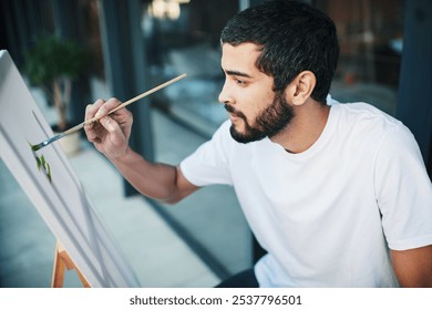 Art, canvas and painting with man on balcony of home for creativity, expression or inspiration outdoor. Paintbrush, relax and wellness with painter person at apartment for hobby or craft on easel - Powered by Shutterstock