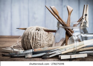 Art And Craft Tools Set. Grunge Wooden Background.