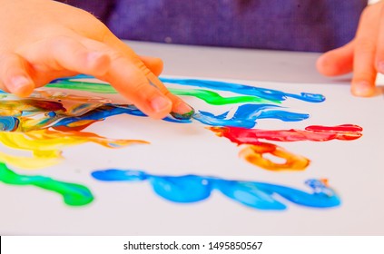 Art, creativity, beauty childhood concept. Little child girl painting with colorful hands. - Powered by Shutterstock