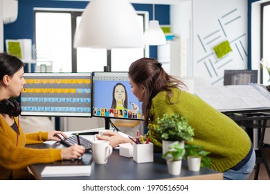 Art Director Consulting Designer Colleague, Retouching Portrait In Photo Editing Software Working In Creative Agency. Retouchers Talking, Color Grading Assets Using Graphic Tablet With Stylus Pen