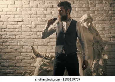 Art Exposition, Antique. Bearded Man Collector Drink Whiskey At Plaster Statue. Sculpture, Business, Architecture. Man Critic At Historical Statue, Heritage, Property. Visitor In Gallery, Travel