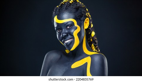 The Art Face. How To Make A Mixtape Cover Design - Download High Resolution Picture with Black and yellow body paint on african woman for your Music Song. Create Album Template with Creative Image.