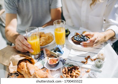 Art food breakfast table white croissant bread fresh juice cheese fruits - Powered by Shutterstock