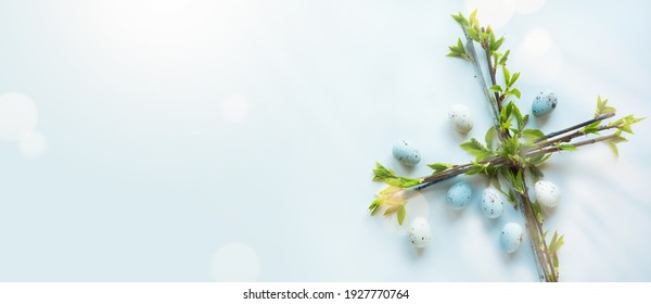 Art Happy Easter Holiday banner or greeting card background with Easter flower cross and Easter eggs on blue background; Christian awakening life symbol  