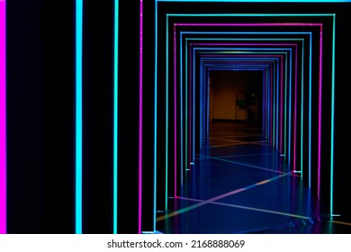 Art illusion of tonnel light up with colorfull led stripes. - Powered by Shutterstock