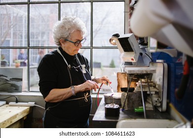 Art Jeweler Working in Studio	 - Powered by Shutterstock