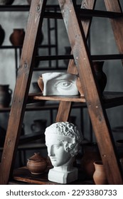Art objects for exhibition of classical and contemporary painting retro sculpture and pottery. Hand illustrations plaster bust statues and abstract shapes spots and lines drawings for poster