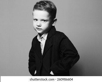art photo of little boy.stylish child in suit. fashion children.business boy