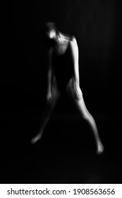 art photography, dancer expresses emotions through movement, body abstraction on black background