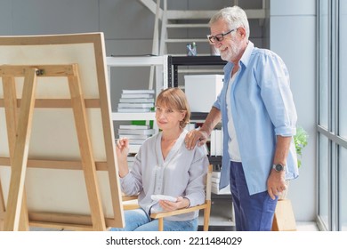 Art school  Creativity   people concept  Happy couple senior woman artist and easel   pencil drawing picture at studio