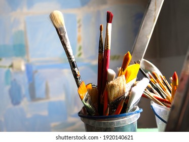 Art studio class painting brushes close up on blue abstract background. Brushes. Artist's workshop, artist's tools. Specially blurred. - Powered by Shutterstock