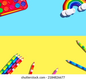 Art Supplies With A Rainbow - Overhead View - Flat Lay