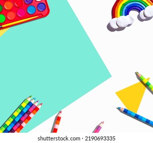 Art Supplies With A Rainbow - Overhead View - Flat Lay