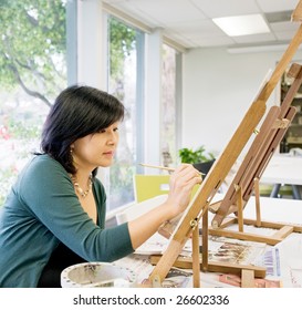 Art teacher painting - Powered by Shutterstock