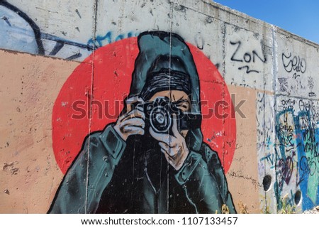 Similar – Image, Stock Photo Graffiti showing a person looking like Zuckerberg with 1984