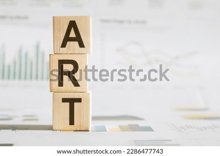 Art word written on wood blocks on table for your desing, concept.
