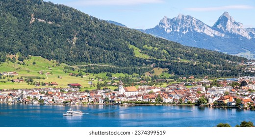 Arth at lake Zug in the Swiss Alps mountains with Kleiner and Grosser Mythen mountain peaks panorama vacation in Switzerland