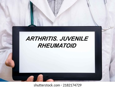 Arthritis.  Doctor With Rare Or Orphan Disease Text On Tablet Screen Arthritis