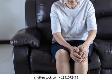 arthritis old person and Elderly woman female suffering osteoarthritis - Shutterstock ID 1151092475