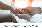 Arthritis or parkinson disease elderly patient, old aged senior woman holding geriatric doctor, cargiving nurse or family assistant