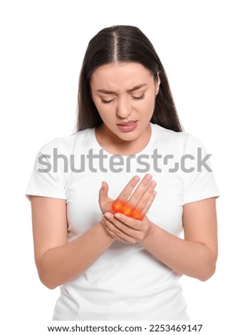 Arthritis symptoms. Young woman suffering from pain in hand on white background