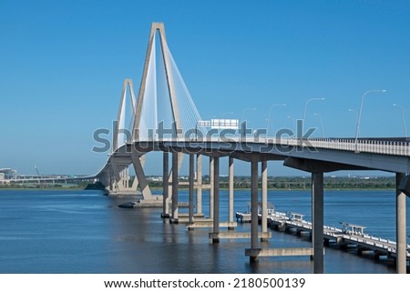 Arthur Ravenel Jr. Bridge, opened in 2005, crosses the Cooper River and Charleston Harbor carries traffic on U.S. 17. Photographed from Mount Pleasant, showing the Waterfront Park pier lower right.