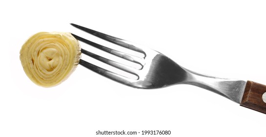 Artichoke with fork isolated on white background