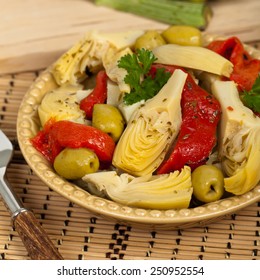 Artichoke, Olive, And Roasted Pepper Antipasto. Selective Focus.