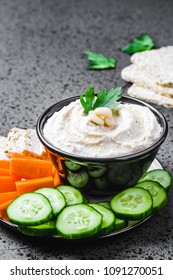 Artichoke White Bean Dip On Dark Concrete Background. Selective Focus, Space For Text. 