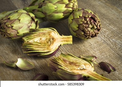 artichokes sliced on wooden background