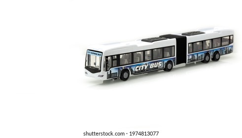 Articulated City Bus. Stretch Bus. Accordion Bus On A White Background. Toy Bus. Isolate. High Quality Photo