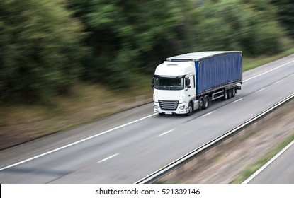 Articulated lorry in motion on the motorway