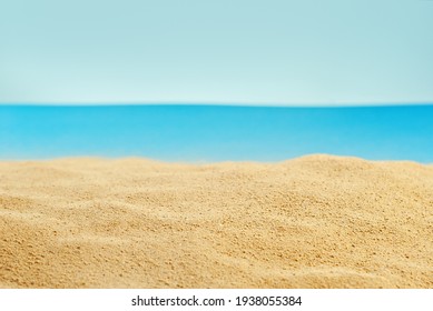 Artificial Beach Made Of Cardboard And Sand. Stylized Sea. The Concept Of Rest, Sea And Vacation.