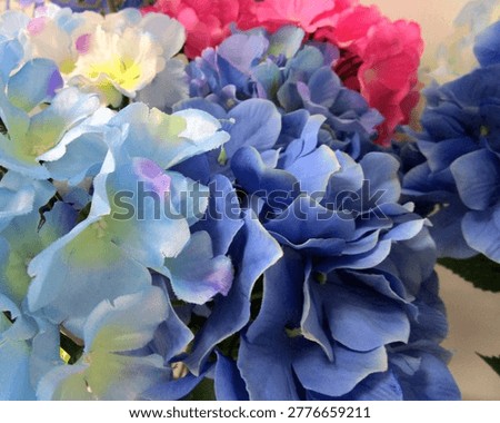 Artificial blue hydrangeas give off a refreshing and lovely image.