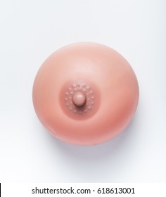 Artificial breast and nipple, made of plastic shaped material with silicone, medical use