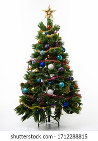 Artificial Christmas Tree On A White Background