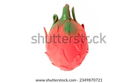 Artificial fruit, dragon fruit isolated on white background. High quality photo