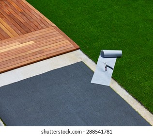 Artificial Grass Turf Installation In Deck Garden With Tools And Joint Roll