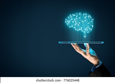 Artificial intelligence (AI), machine deep learning, data mining and another modern computer technologies concepts. Brain representing artificial intelligence and businessman holding futuristic tablet