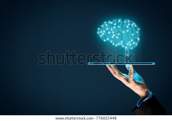 Artificial intelligence (AI), machine deep\
learning, data mining and another modern computer technologies\
concepts. Brain representing artificial intelligence and\
businessman holding futuristic\
tablet