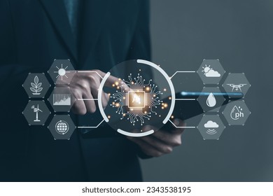 Artificial intelligence (Ai) Smart farmer technology. Ordering through a remote system with computer. Climate forecasting, moisture measurement, plant growth. Man touching tablet and virtual screen. - Powered by Shutterstock