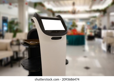 Artificial intelligence assistant personal robot for serve foods in restaurant. Robotic trend technology business concept