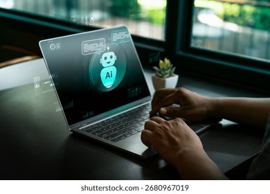 Artificial intelligence chatbot assistant on laptop computer with digital AI robot icon, virtual conversation technology, machine learning, customer support, automation, smart data analysis concept