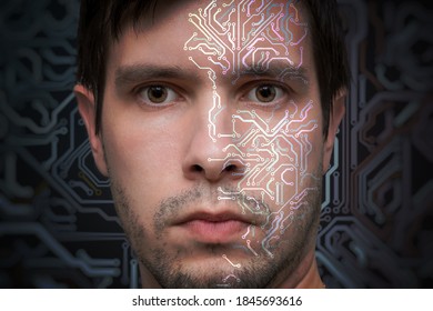 Artificial intelligence concept. Face of man with electronic circuit.