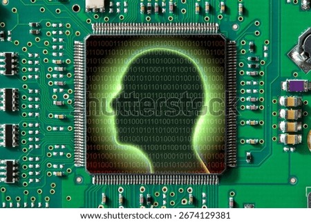 ARTIFICIAL INTELLIGENCE CONCEPT WITH HUMAN PROFILE ON COMPUTER CHIP - Digital brain and binary code on a circuit board illustrating AI, neural networks, and machine learning technology