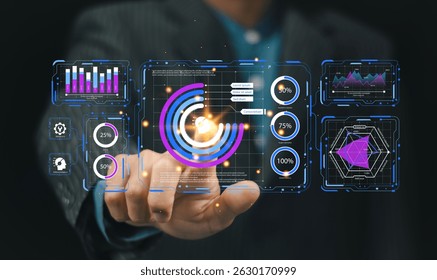 Artificial intelligence and data analysis concept. Businessman using AI-powered technology to process big data, generate insights, Futuristic digital transformation in finance and business.
