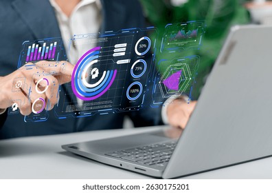 Artificial intelligence and data analysis concept. Businessman using AI-powered technology to process big data, generate insights, Futuristic digital transformation in finance and business.
