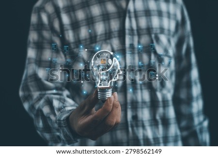 Artificial intelligence and data analytics concept featuring AI-powered digital brain in a light bulb, symbolizing machine learning, innovation, smart technology, automation, and data networks.