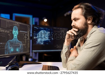 Artificial intelligence entity with anthropomorphic body escaping control of creator, appearing on screen, confusing programmer.