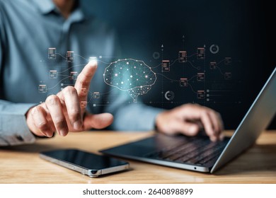 Artificial intelligence machine learning ai. Neural networks. Data science technology. A man is using a laptop and a cell phone. The laptop screen shows a brain with a finger pointing at it.